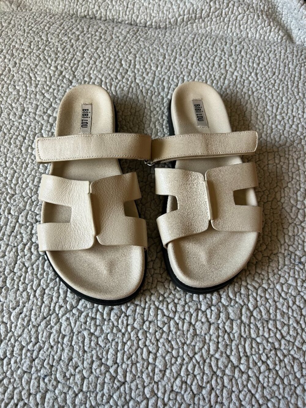 Bibi Lou -- cream flat sandals, H cutout strap, adjustable top ankle strap